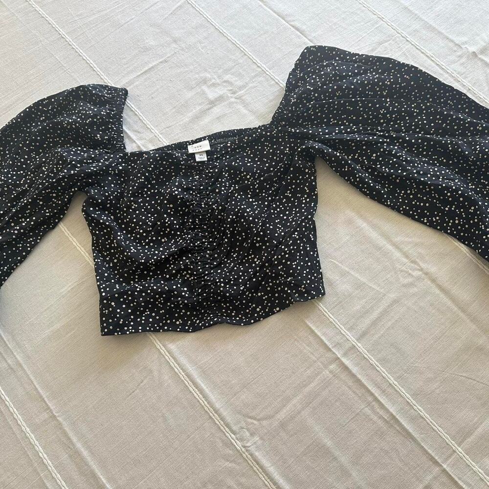 A new day black polka